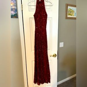 Beautiful ruby red formal halter style dress. Size: 6